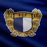 thumb2-fc-famalicao-fabric-logo-4k-blue-fabric-background-primeira-liga-bokeh